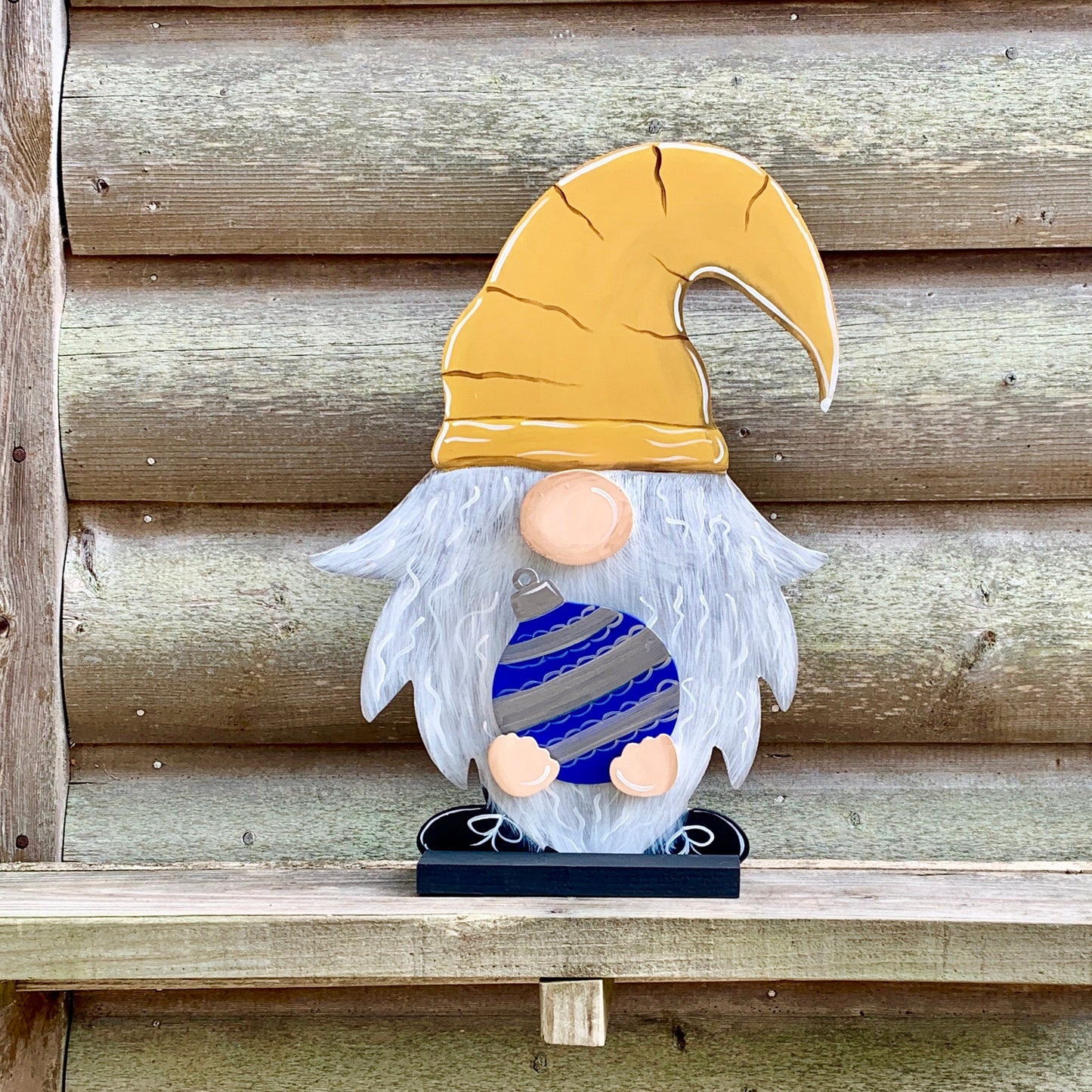 gnome with interchangeable seasonal cutouts